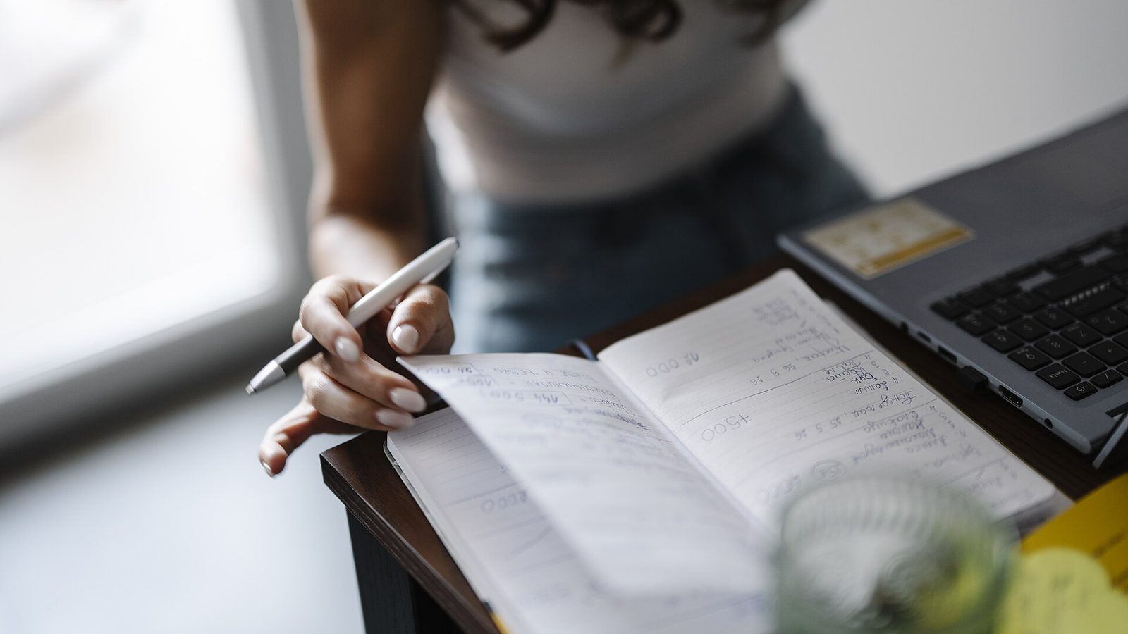 Writing in a notebook